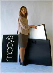 Disassembled two over two portable Velcro tradeshow display with portfolio case
